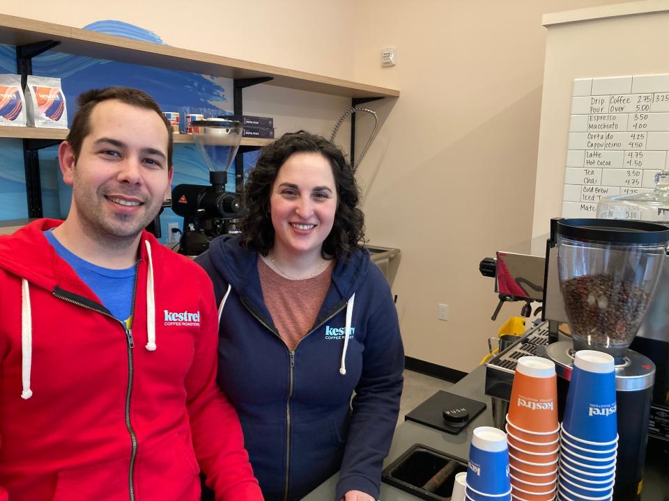 Johnny and Charlotte Steverson, owners of Kestrel Coffee Roasters, stand behind the coffee bar at the Pine Street shop March 31, 2022.