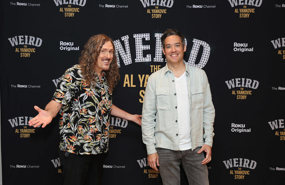 (L-R) "Weird Al" Yankovic and Eric Appel pose for a photo during a "Weird: The Al Yankovic Story" screening at The London Hotel on April 16, 2023 in Los Angeles, California.