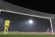 Argentina's goalie Sergio Romero (L) stands in the goal after failing to stop a game-winning penalty kick goal scored by Chile's Alexis Sanchez in the Copa America 2015 final soccer match at the National Stadium in Santiago, Chile, July 4, 2015. REUTERS/Henry Romero