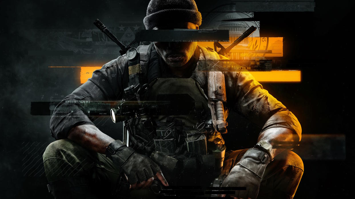  Call of Duty: Black Ops 6 key art (no logo) - seated black ops soldier with guns in his hands facing the camera, redaction line over his eyes. 