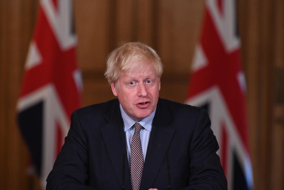 Prime Minister Boris Johnson during a virtual press conference at Downing Street, London, following the announcement that the legal limit on social gatherings is set to be reduced from 30 people to six. The change in the law in England will come into force on Monday as the Government seeks to curb the rise in coronavirus cases.