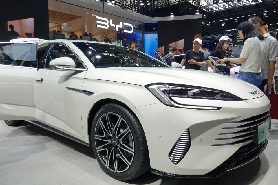 Visitors are looking at a BYD DM-i electric car at the 2024 Beijing International Automotive Exhibition in Beijing, China, on May 3, 2024. (Photo by Costfoto/NurPhoto via Getty Images)