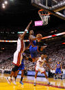 MIAMI, FL - APRIL 30: J.R. Smith #8 of the New York Knicks shoots over Chris Bosh #1 of the Miami Heat during Game Two of the Eastern Conference Quarterfinals in the 2012 NBA Playoffs at American Airlines Arena on April 30, 2012 in Miami, Florida. NOTE TO USER: User expressly acknowledges and agrees that, by downloading and/or using this Photograph, User is consenting to the terms and conditions of the Getty Images License Agreement. (Photo by Mike Ehrmann/Getty Images)