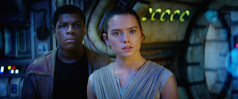 John Boyega and Daisy Ridley stand in a ship