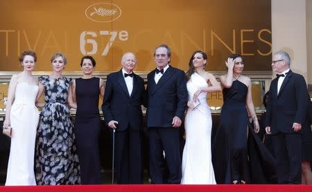 (L-R) Cast members Miranda Otto and Sonja Richter, Cannes Film festival director Gilles Jacob, Dawn Laurel-Jones, director and actor Tommy Lee Jones, cast members Hilary Swank, Victoria Jones, and Cannes Film festival general delegate Thierry Fremaux pose on the red carpet as they arrive for the screening of the film "The Homesman" in competition at the 67th Cannes Film Festival in Cannes May 18, 2014. REUTERS/Yves Herman