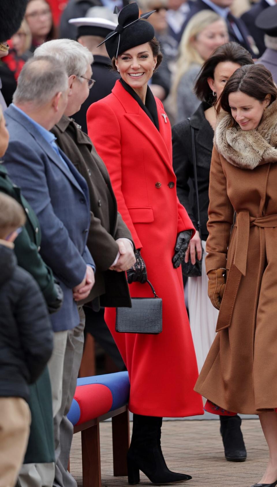 Catherine, Princess of Wales smiles during a visit to the 1st Battalion Welsh Guards