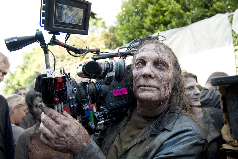 <p><em>TWD</em> director, EP, and makeup whiz Greg Nicotero takes on another role — walker — for the Dumpster scene in “Thank You.”<br><br>(Photo: AMC) </p>