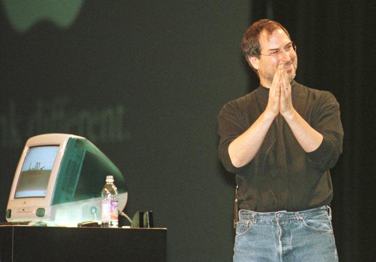 Steve Jobs introduces the iMac personal computer in San Francisco in Spetember 1, 1998, 14 years after the release of the first Mac