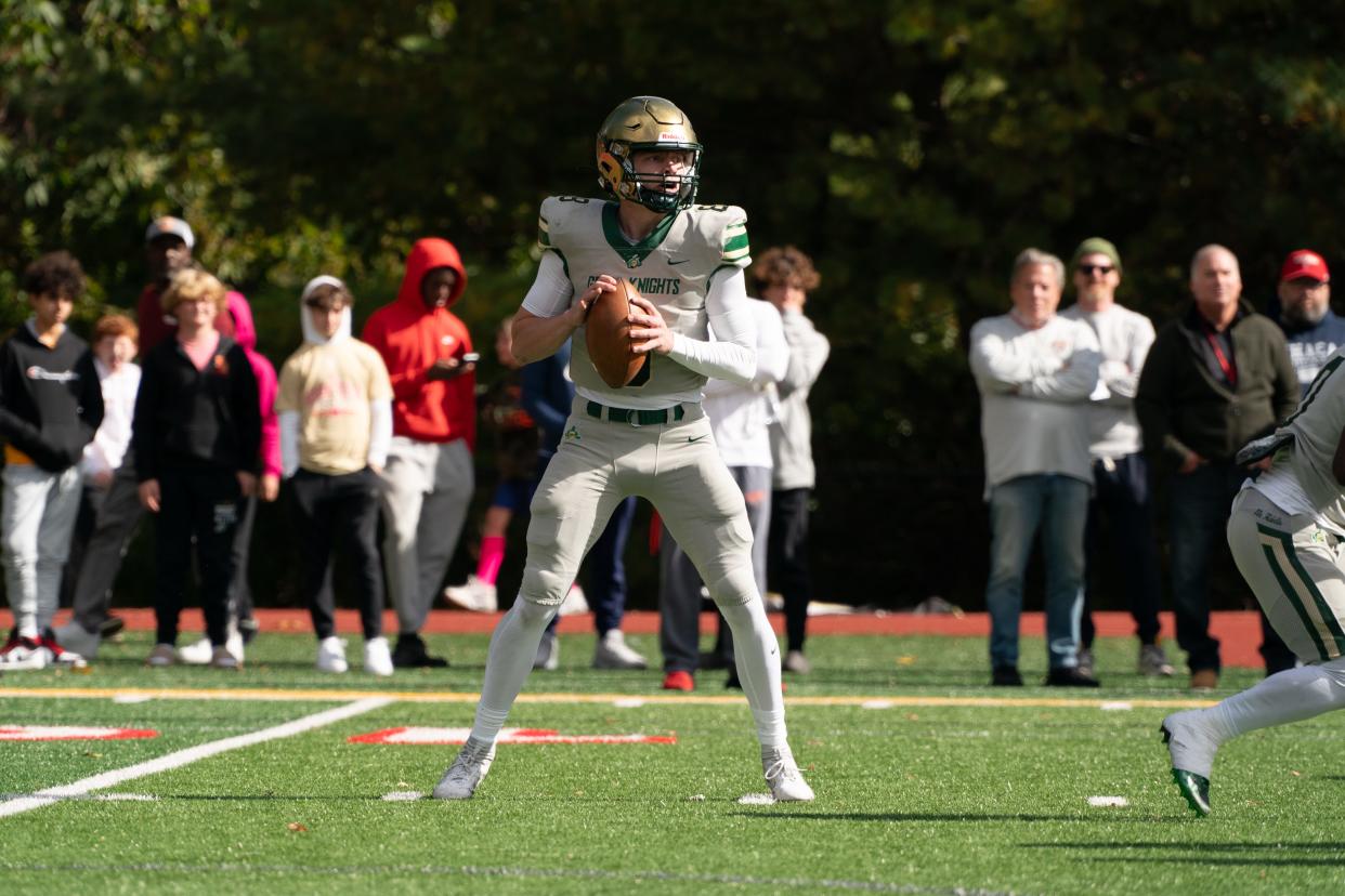 Patrick Grusser (8) of St. Joseph looks down field to pass the football during a football game between Bergen Catholic High School and St. Joseph Regional High School at Bergen Catholic High School in Oradell on Sunday, October 15, 2023.