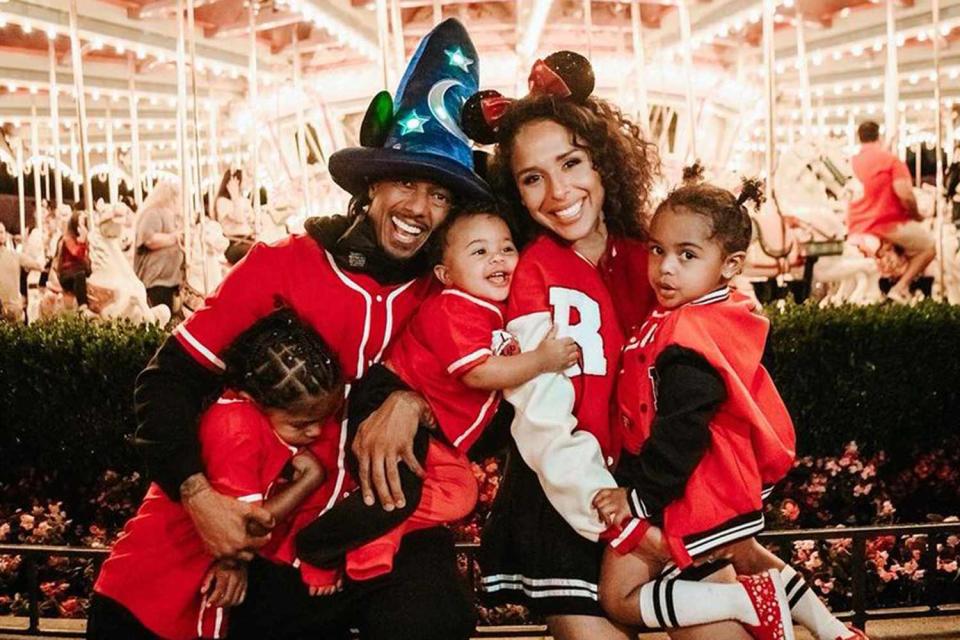 <p>Amber Rain</p> Nick Cannon and Britanny Bell with Rise, Powerful, and Golden at Disneyland for Rise