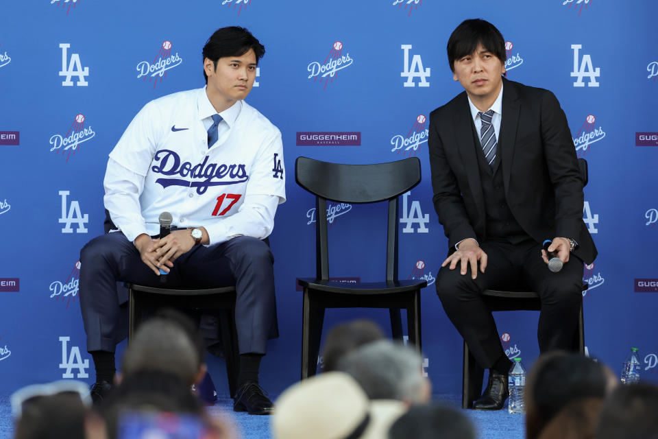 LOS ANGELES, CA - DECEMBER 14: Shohei Ohtani answers questions and Ippei Mizuhara translates during the Shohei Ohtani Los Angeles Dodgers Press Conference at Dodger Stadium on Thursday, December 14, 2023 in Los Angeles, California. (Photo by Rob Leiter/MLB Photos via Getty Images)