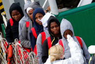 Migrants disembark from a MSF (Medecins Sans Frontieres) vessel in the Sicilian harbour of Catania, Italy, November 6, 2016. REUTERS/Antonio Parrinello