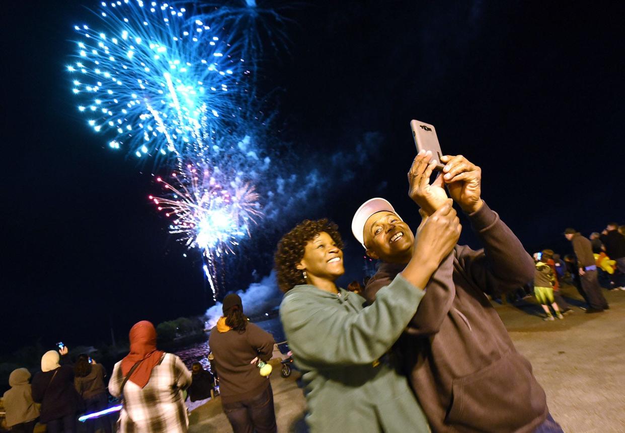 Ann and Mike Gore take a selfie in 2017 as they enjoy the N.C. Azalea Festival fireworks along Water Street in downtown Wilmington.