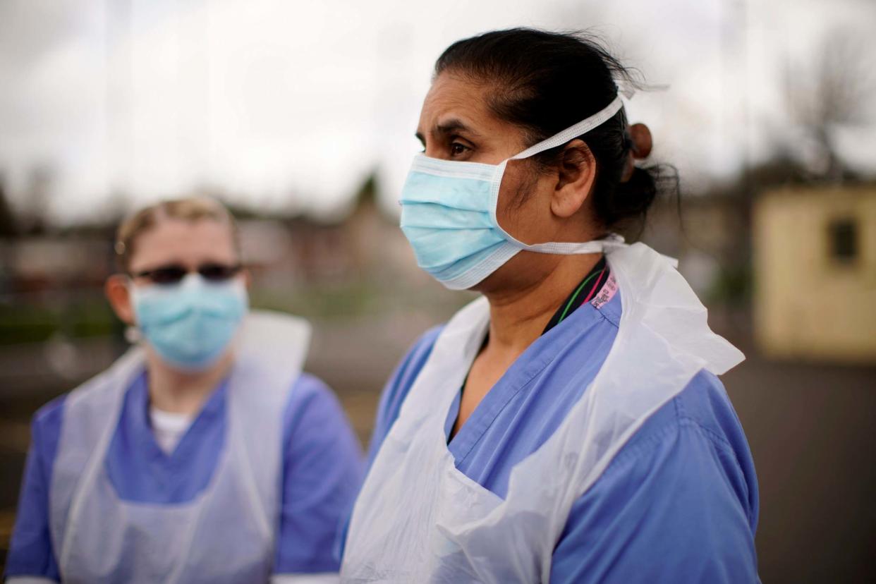 NHS staff wearing masks: Getty Images