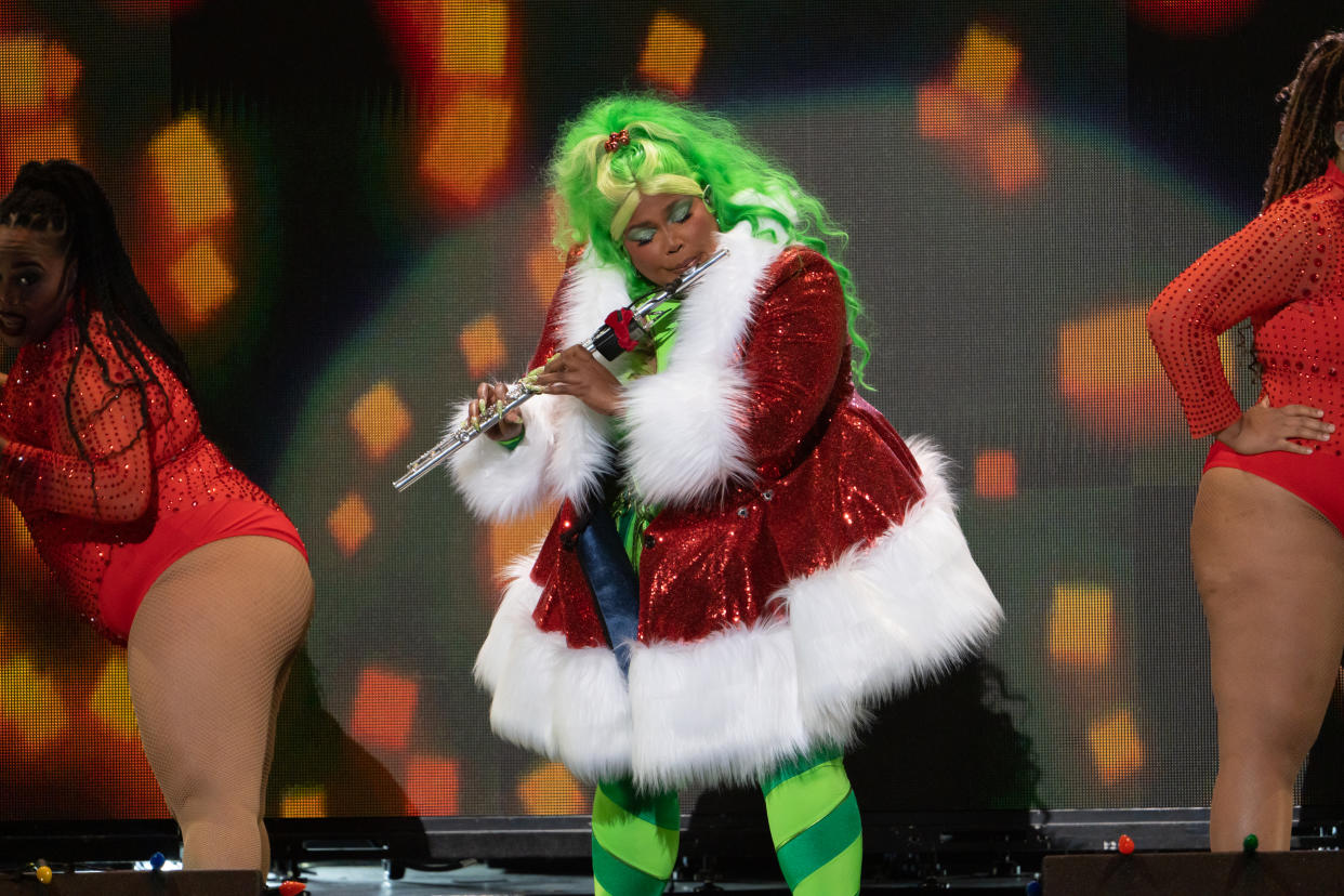 Lizzo reveals the Grinch outfit she wore to Jingle Ball. (Photo: Manny Carabel/FilmMagic)