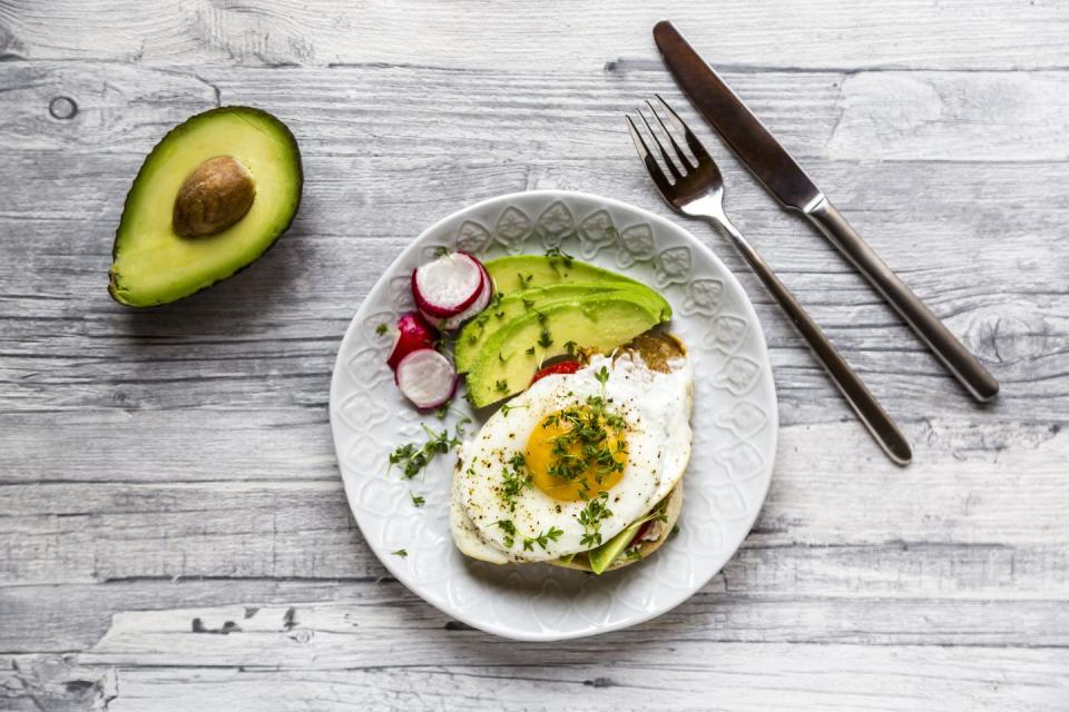 <p>What you eat can help you to stick to a routine. Nutritionist <a href="https://www.jennahopenutrition.com/" rel="nofollow noopener" target="_blank" data-ylk="slk:Jenna Hope;elm:context_link;itc:0;sec:content-canvas" class="link ">Jenna Hope</a> recommends eggs, as the yolks contain choline, which is pivotal for supporting memory, mood, and cognition. As well as eggs, enjoy oily fish and nuts.</p><p>'Omega-3 in oily fish is associated with improved concentration and better cognitive performance. Nuts (specifically walnuts) and seeds are also a source of ALA omega-3 which is converted into EPA and DHA, the active forms of omega-3,' Jenna explains. 'Vitamin D from the sun as well as foods such as salmon, mushrooms and eggs can boost brain power.'</p>