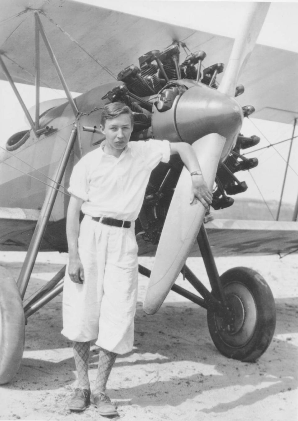 Z. Smith Reynolds rests his arm casually on his biplane in a photo taken around 1928. Reynolds was fascinated with planes and became the nation’s youngest licensed pilot at age 16. 