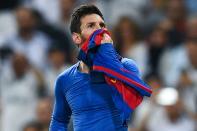 <p>Lionel Messi celebrates his dramatic last-gasp winner against fierce rivals Real Madrid in El Clasico to go top of LaLiga </p>