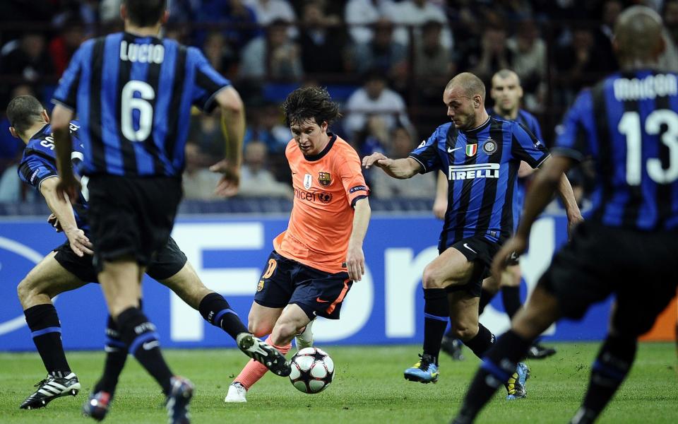 Lionel Messi tries to escape the attention of Inter Milan in 2010 - The night Inter Milan left a scar on Pep Guardiola's soul - AFP/Filippo Monteforte