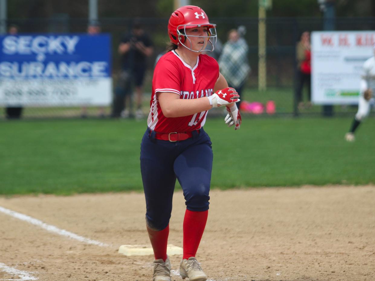 Bridgewater-Raynham's Talia Faria takes a jump off third during a non-league game against King Philip.