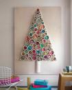 This idea is brilliant. Display the decorations inside tubes instead of on branches. [Photo: Pinterest]