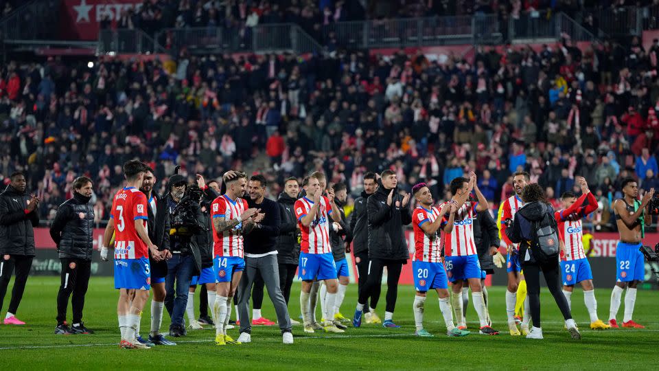 Míchel celebrates with his players after a thrilling win over Atletico. - Pau Barrena/AFP/Getty Images