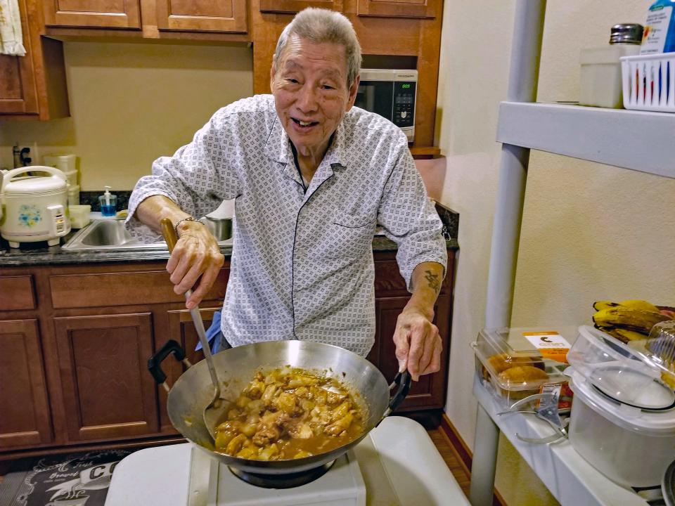 Even after Mabel’s parents moved to an assisted living facility, her dad, Fung (Tony) Wong, continued to cook amazing meals — all on a tiny electric hotplate. Here in 2019, he makes braised chicken with potatoes. He was still cooking a month before he passed away at age 90.