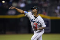 Miami Marlins starting pitcher Edward Cabrera throws against the Arizona Diamondbacks during the first inning of a baseball game, Wednesday, May 10, 2023, in Phoenix. (AP Photo/Matt York)