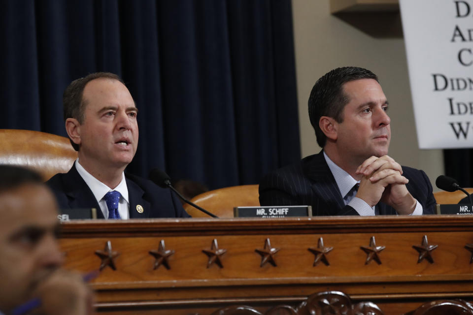 House Intelligence Committee Chairman Adam Schiff, D-Calif., left, gives his opening statement before U.S. Ambassador to the European Union Gordon Sondland testifies before the House Intelligence Committee on Capitol Hill in Washington, Wednesday, Nov. 20, 2019, during a public impeachment hearing of President Donald Trump's efforts to tie U.S. aid for Ukraine to investigations of his political opponents. Rep. Devin Nunes, R-Calif, the ranking member of the House Intelligence Committee, is right. (AP Photo/Alex Brandon)