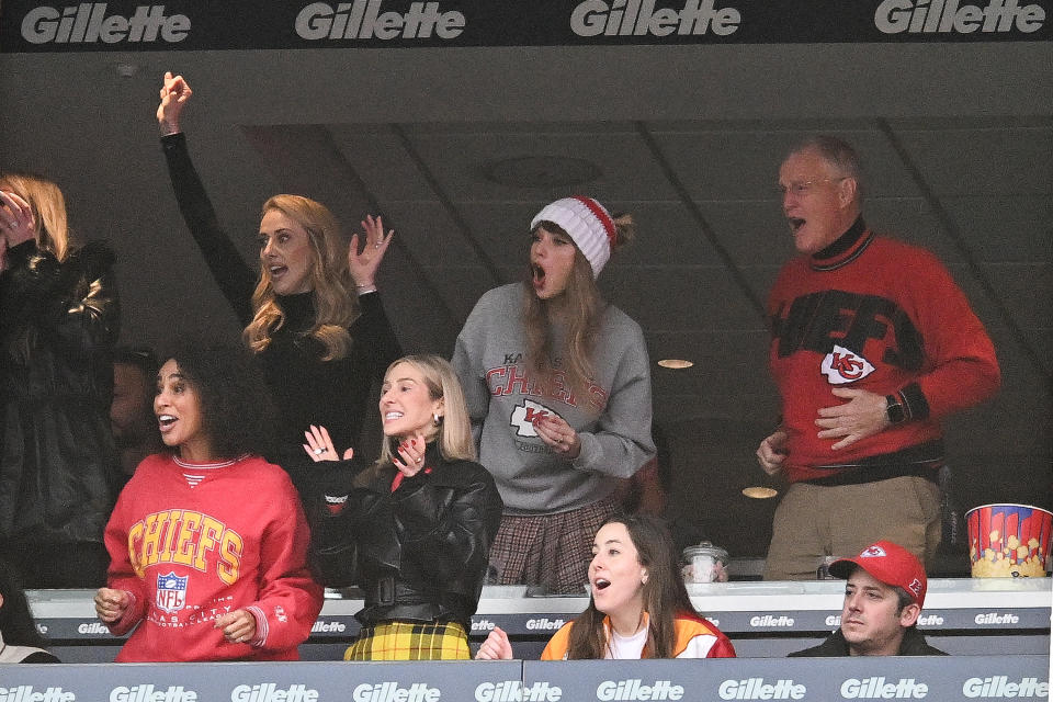 FOXBORO, MA - DECEMBER 17: Brittany Mahomes (back row 2nd L), Taylor Swift, and Scott Swift cheer while watching the game between the Kansas City Chiefs and New England Patriots at Gillette Stadium on December 17, 2023 in Foxboro, Massachusetts. (Photo by Kathryn Riley/Getty Images)