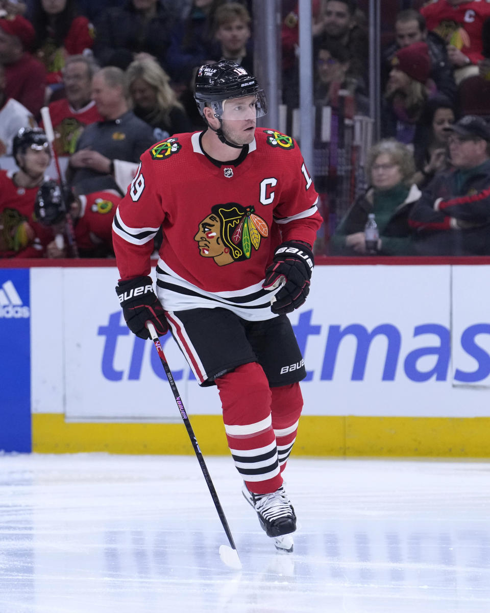 Chicago Blackhawks' Jonathan Toews takes the ice at the beginning of the team's NHL hockey game against the New Jersey Devils on Saturday, April 1, 2023, in Chicago. Toews returned from a two-month medical leave of absence. (AP Photo/Charles Rex Arbogast)