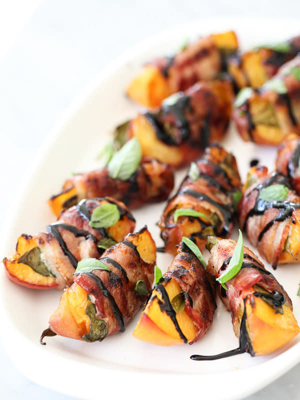 <strong>Get the <a href="http://www.foodiecrush.com/2014/09/bacon-wrapped-grilled-peaches-with-balsamic-glaze/" target="_blank">Bacon Wrapped Grilled Peaches with Balsamic Glaze recipe</a> from Foodie Crush</strong>