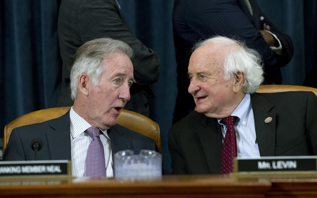 House Ways and Means Committee Ranking Member Rep. Richard Neal, speaks with Rep. Sandy Levin, D-Mich., April 12, 2018 on Capitol Hill in Washington. (AP Photo/Jose Luis Magana)