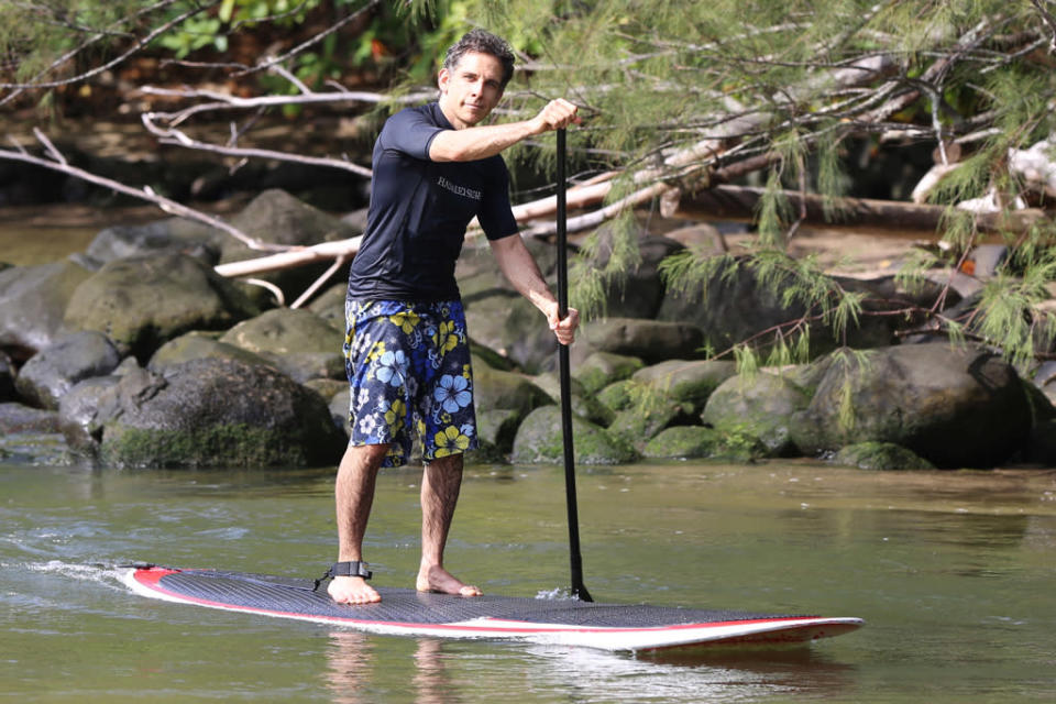 Ben Stiller stand up paddles in Hawaii