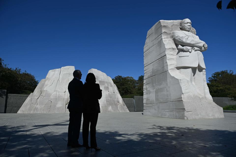 US President Joe Biden (L) and US Vice President Kamala Harris arrive for a ceremony marking the 10th Anniversary dedication of the Martin Luther King, Jr., Memorial, in Washington, DC, on Oct. 21, 2021.