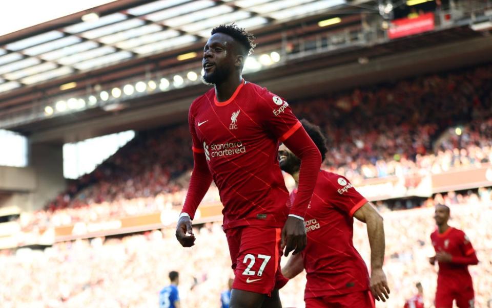 Origi celebrates his goal to clinch the points at Anfield (Getty)