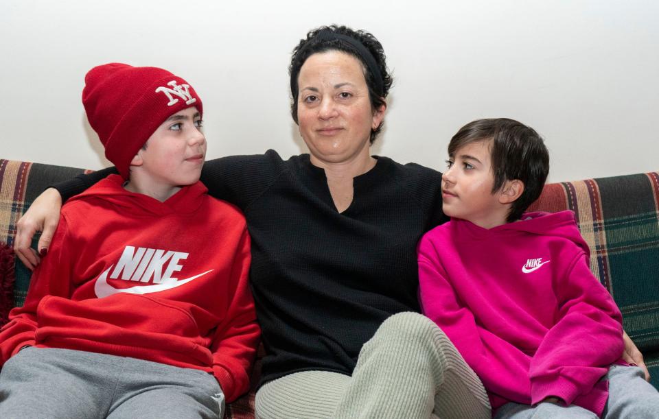 Cindy Russo, center, with her sons Gavin, 11, left, and Mason, 8.