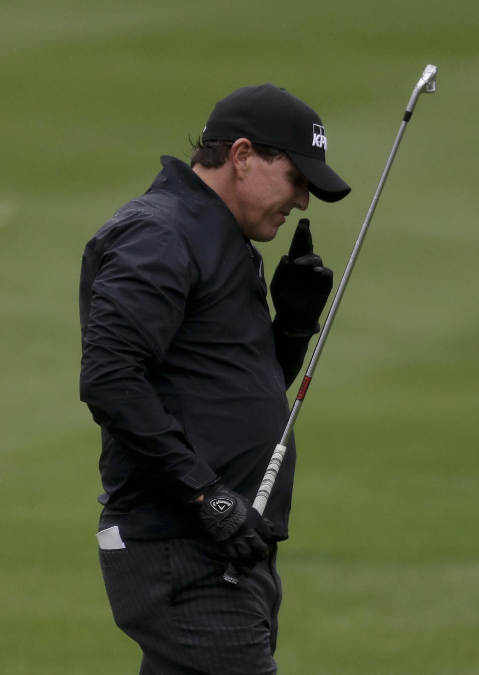 Phil Mickelson reacts to his chip to the second green during the first round of the CareerBuilder Challenge at the La Quinta County Club Thursday, Jan. 19, 2017 in La Quinta, Calif. (AP Photo/Chris Carlson)