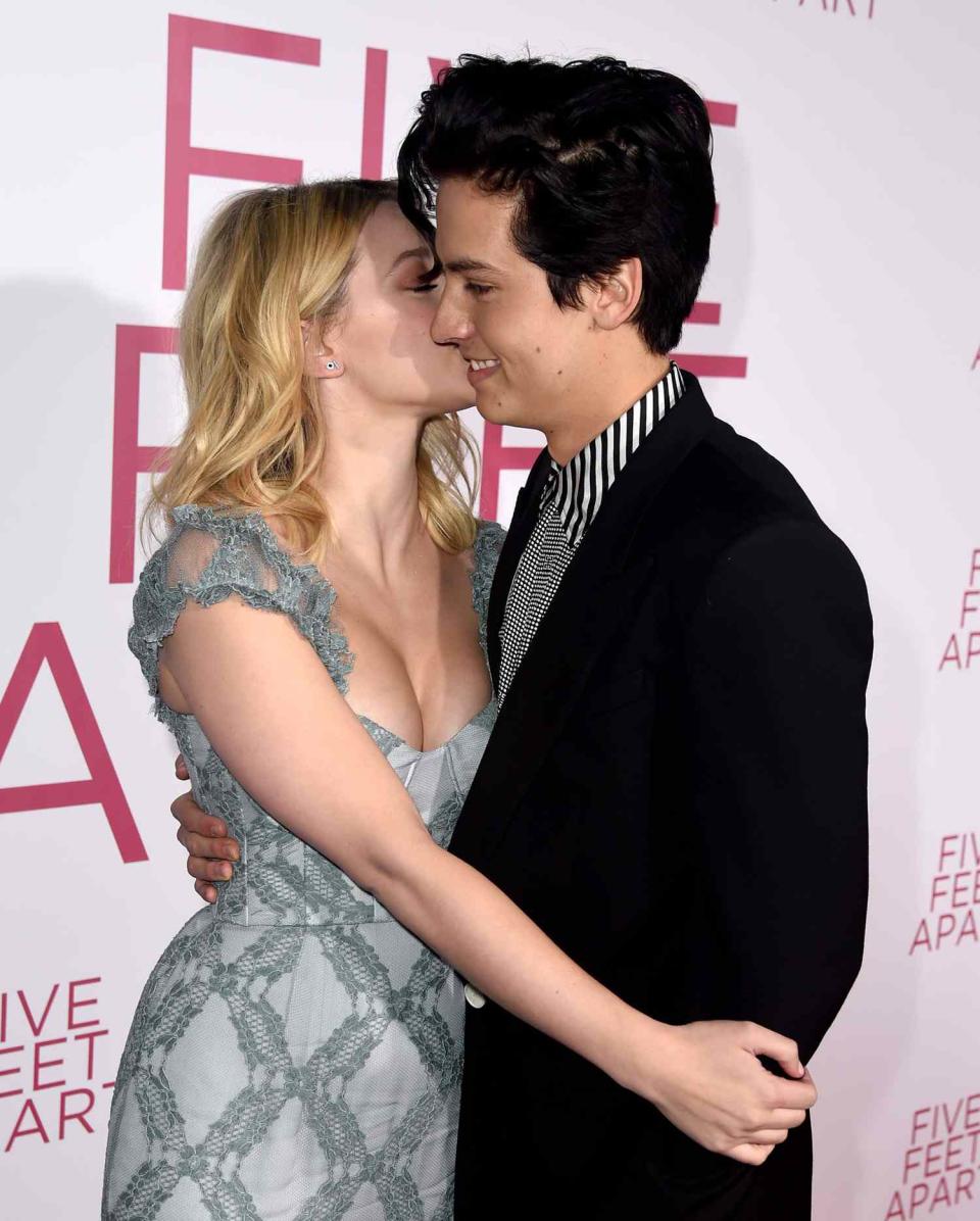 Lili Reinhart (L) and Cole Sprouse arrive at the premiere of CBS Films' "Five Feet Apart" at the Fox Bruin Theatre on March 07, 2019 in Los Angeles, California