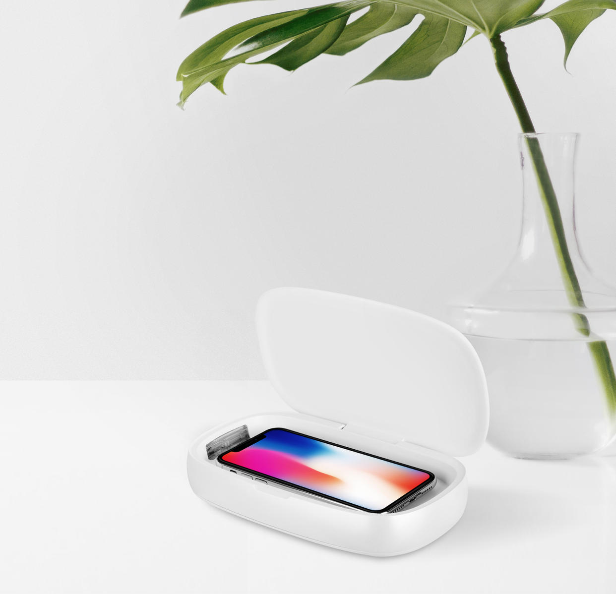 The Momax Q.Power is a UV box that doubles as a wireless charging pad when you put your phone on its cover. (PHOTO: Momax)