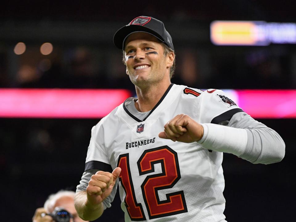 Tom Brady walks off the field after a preseason game.