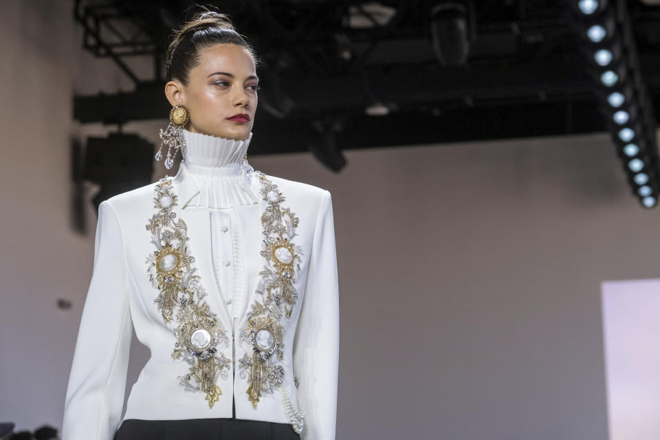 The Badgley Mischka collection is modeled at Spring Studios during NYFW Fall/Winter 2020 on Saturday, Feb. 8, 2020, in New York. (Photo by Charles Sykes/Invision/AP)