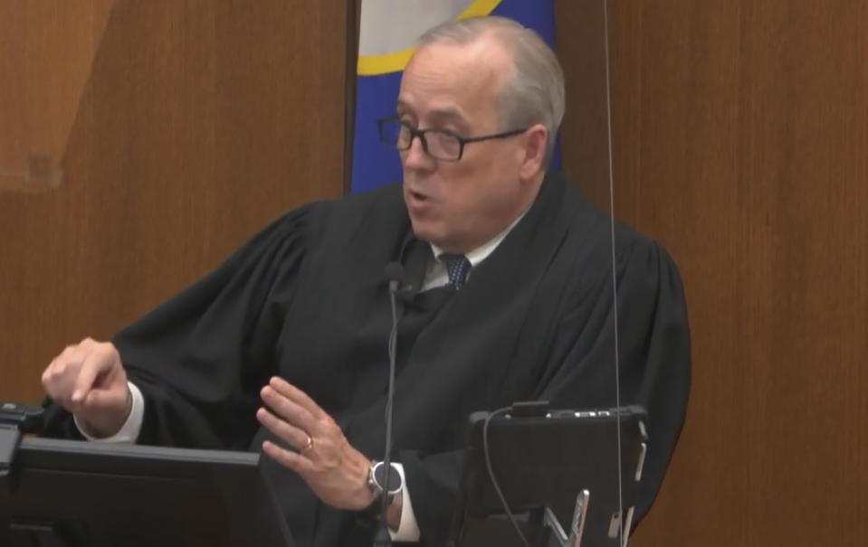 In this image from video, Hennepin County Judge Peter Cahill dresses the court after the judge put the trial into the hands of the jury. Monday, April 19, 2021, in the trial of Chauvin, in the May 25, 2020, death of George Floyd at the Hennepin County Courthouse in Minneapolis, Minn. (Court TV via AP, Pool)