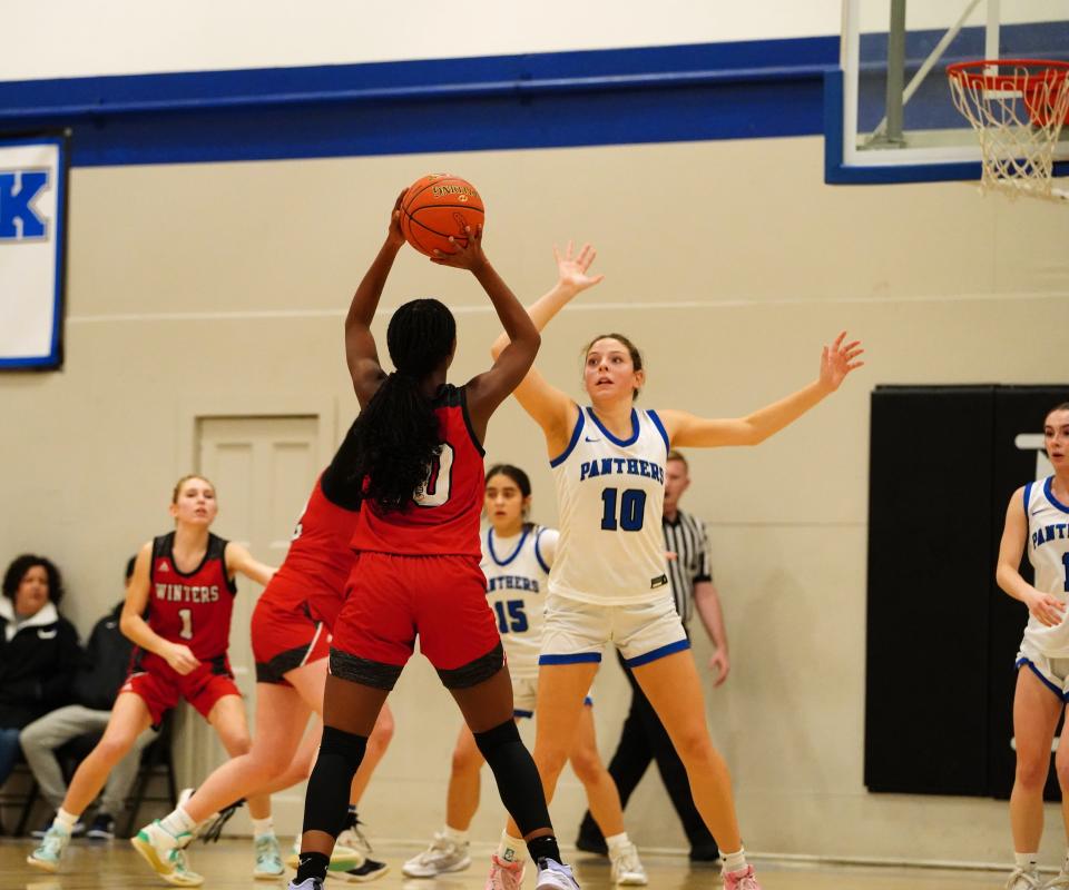 U-Prep’s Amiah Cornejo (10) tries to guard Winters’s Jordan Tucker (10) in the second quarter.