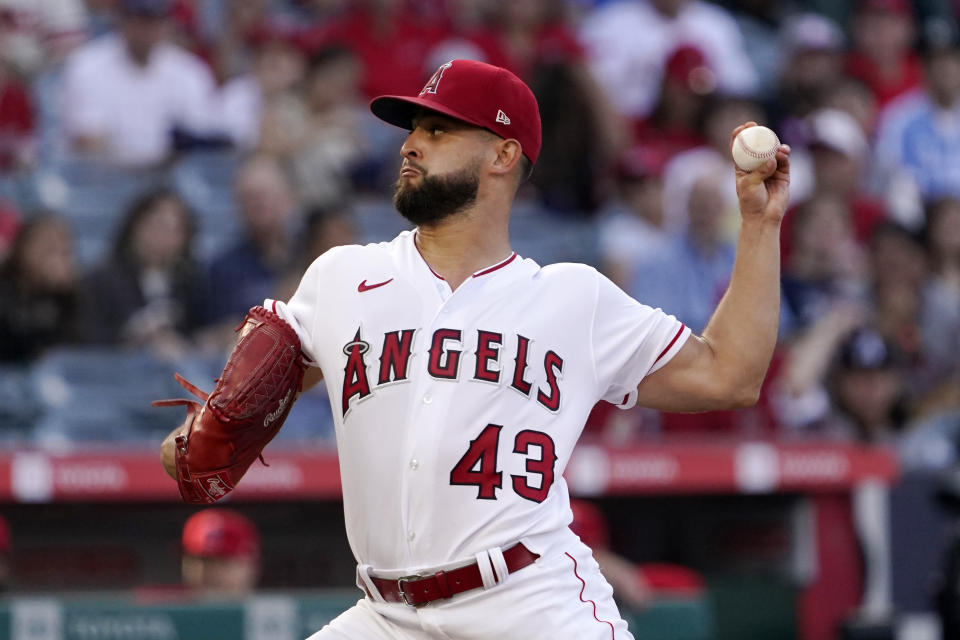 Los Angeles Angels starting pitcher Patrick Sandoval throws to the plate during the first inning of a baseball game against the Texas Rangers Friday, July 29, 2022, in Anaheim, Calif. (AP Photo/Mark J. Terrill)