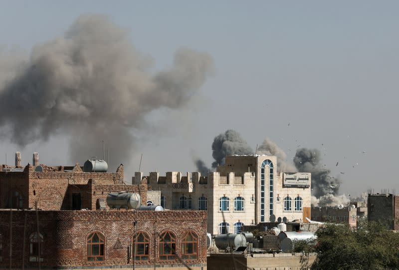 Smoke billows from the sites of Saudi-led air strikes in Sanaa