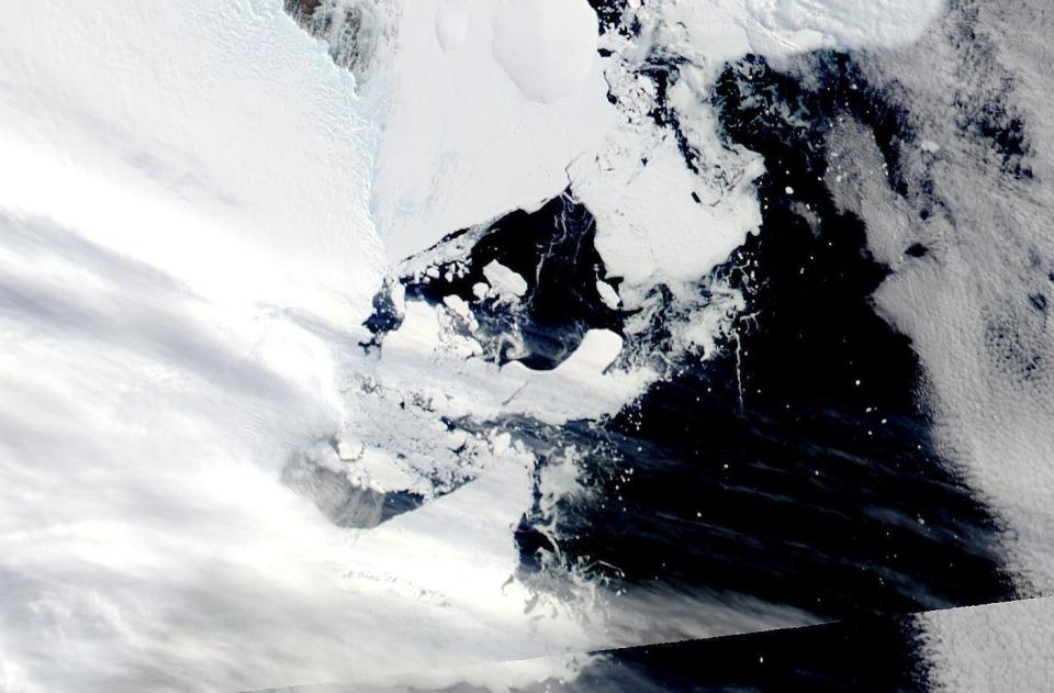 This satellite image provided by NASA shows Aqua MODIS 16 on March 2022, shows C-38 in one piece chasing the main piece of C-37 moving west on the coastal current. Scientists are concerned because an ice shelf the size of New York City collapsed in East Antarctica, an area that had long been thought to be stable. The collapse last week was the first time scientists have ever seen an ice shelf collapse in this cold area of Antarctica. (NASA via AP)