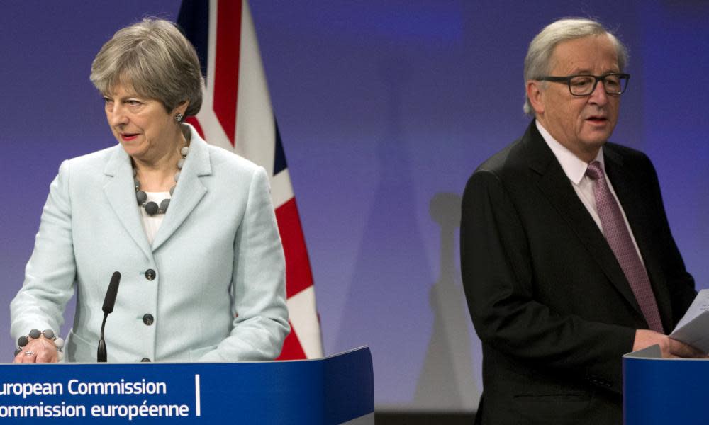 Theresa May and the European commission president, Jean-Claude Juncker.