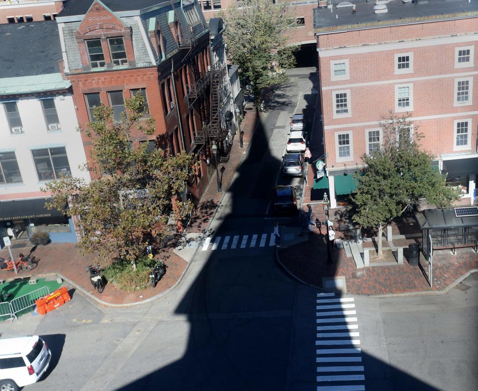 The shadow of the North Church steeple is cast upon High Street in Market Square Oct. 7, 2021.