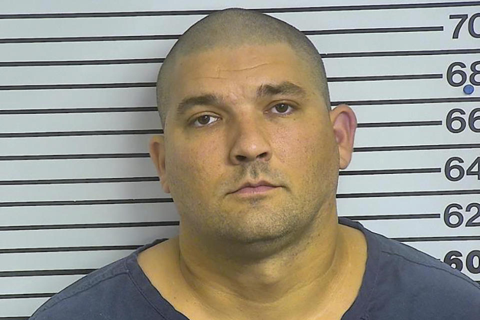 This is a Forrest County Adult Detention Center booking photograph of Joshua Hartfield a former Richland police officer, taken in Hattiesburg, Miss., on Thursday, Aug. 3, 2023. Hatfield and five other former law enforcement officers pleaded guilty to a racist assault on two Black men in a home raid that ended with an officer shooting one man in the mouth. (Forrest County Adult Detention Center via AP)